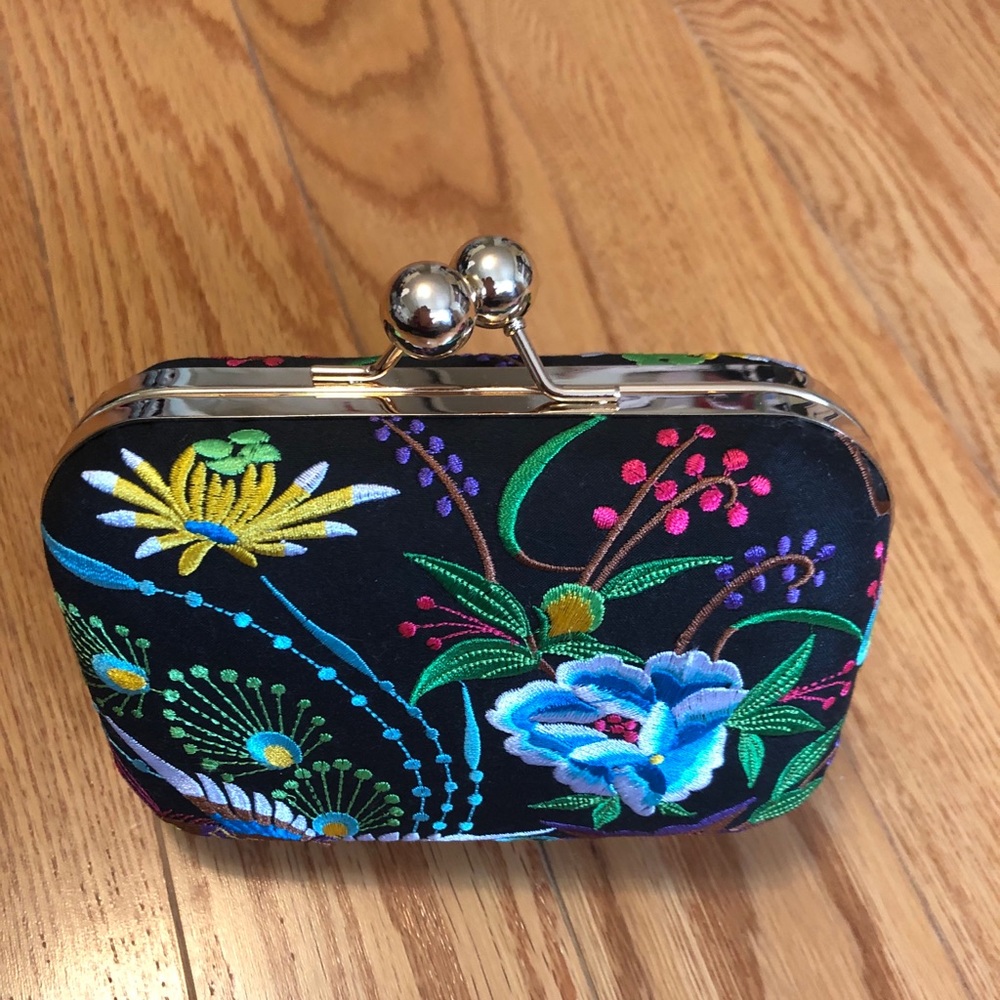 Hand stitched clutch